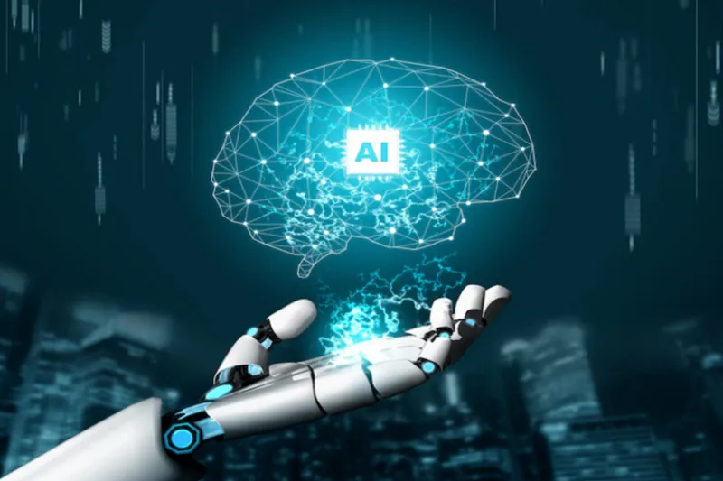 mano di robot e scritta AI